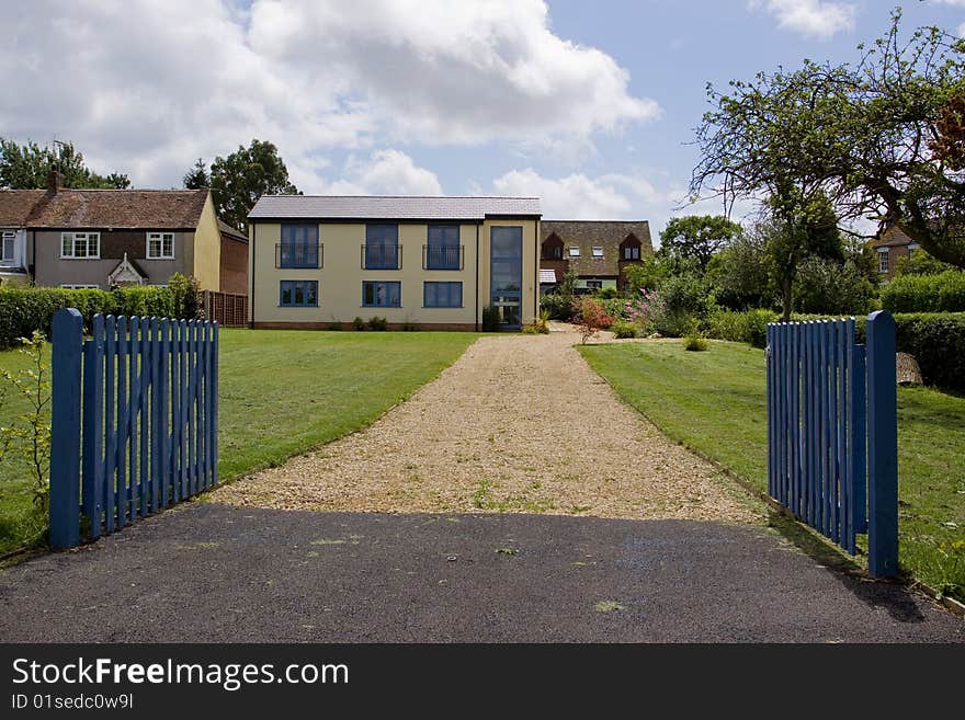 A newly built modern home, part of a large property development. A newly built modern home, part of a large property development