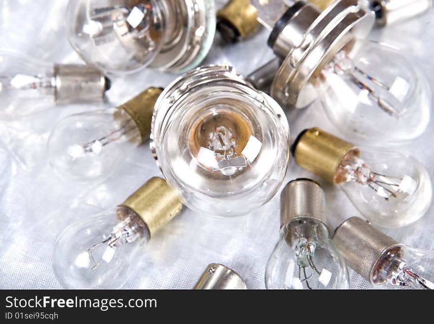 Light bulb on silver background