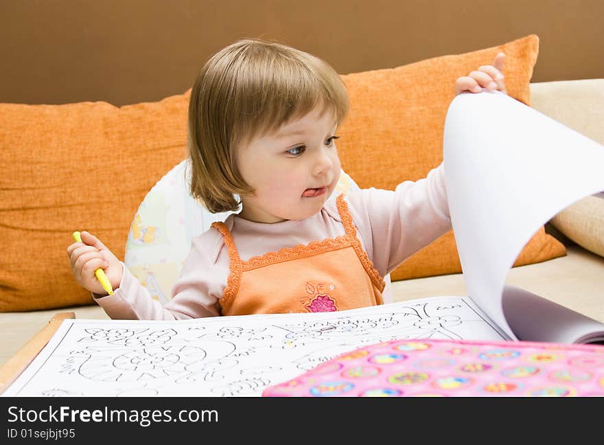 Sweet toddler baby girl drawing