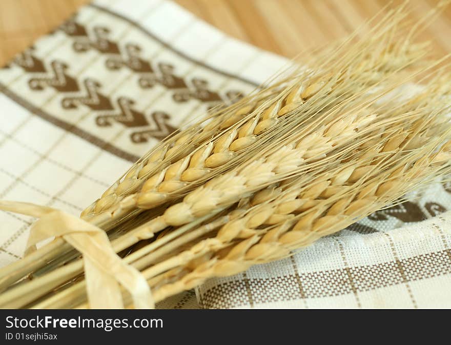 Gold wheat harvest on  a kitchen towel