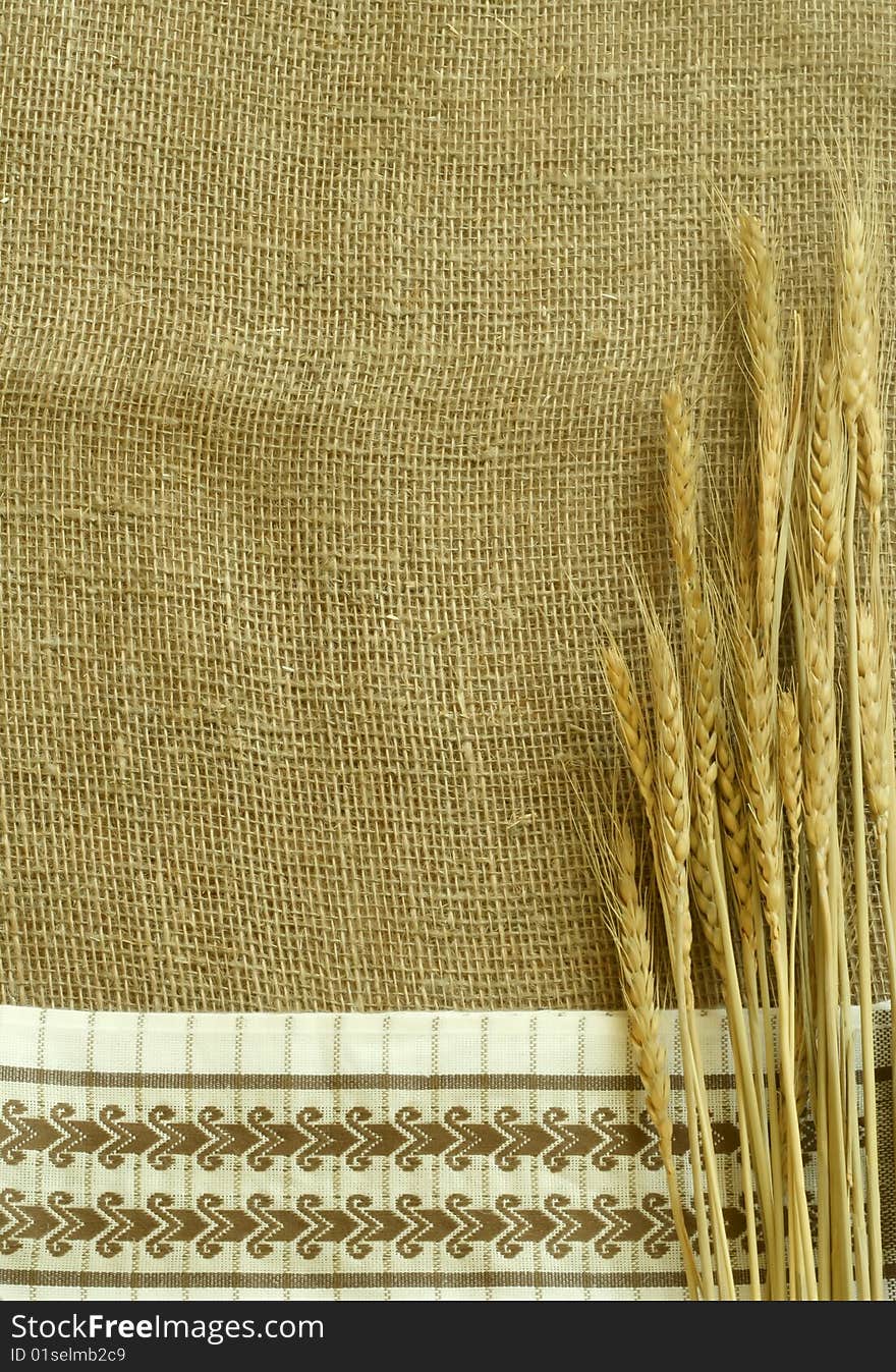 wheat ears on sacking and kitchen towel