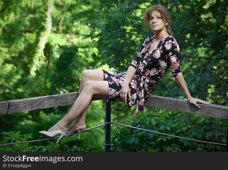 Lovely girl on the green background