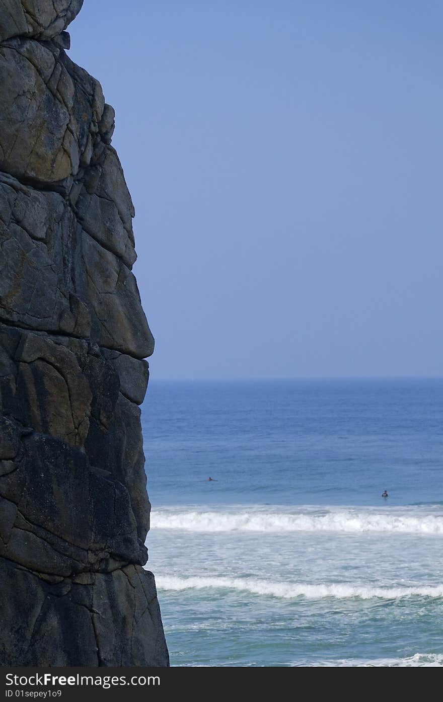 A head of a man scult on the rock. A head of a man scult on the rock