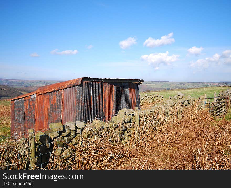 Corrigated iron shed on farmland in Yorkshire Moors. Corrigated iron shed on farmland in Yorkshire Moors