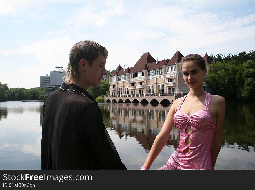 Couple walking outdoor near lake