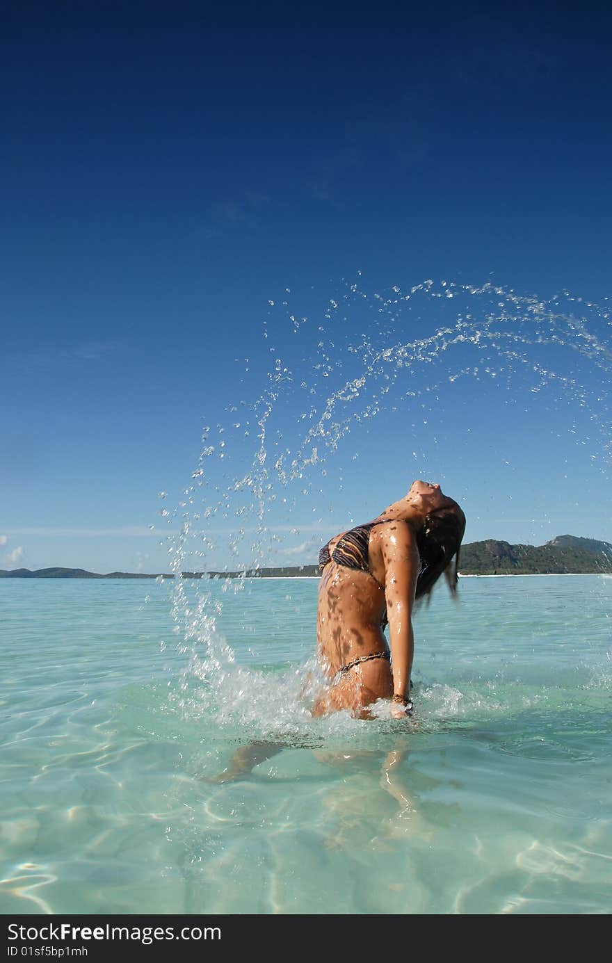 Beautiful young teenage girl flicking hair