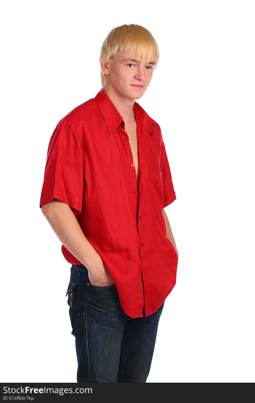 Young blonde man in red shirt posing. Isolated.