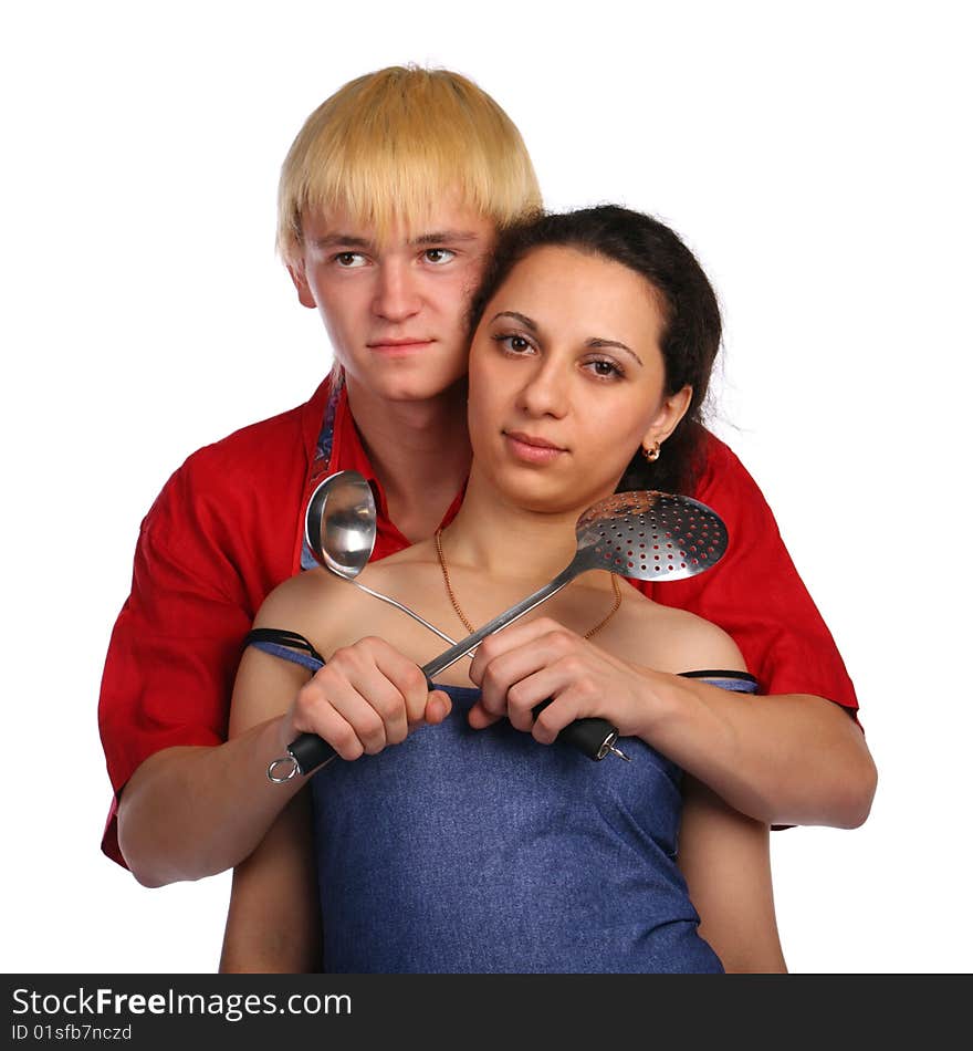 Young Man And Woman Embraces With Utensil