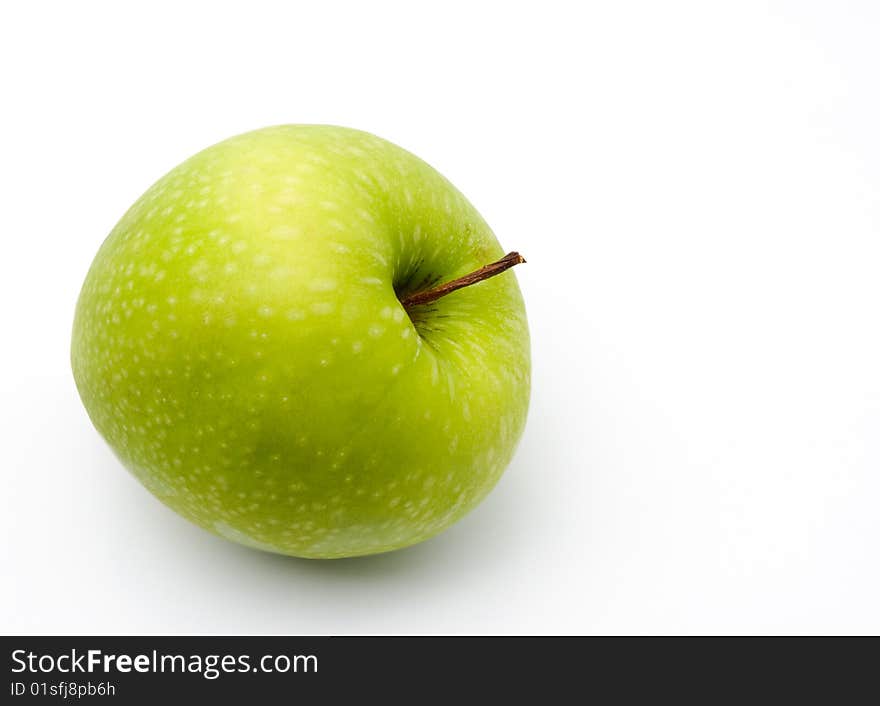 Ripe green apple on a white background. Ripe green apple on a white background