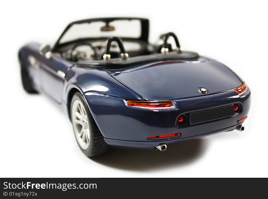 Blue roadster sports model car. Blue roadster sports model car