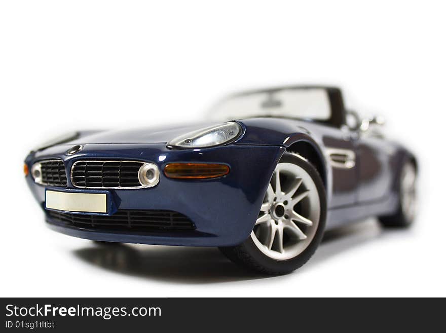 Blue roadster sports model car. Blue roadster sports model car