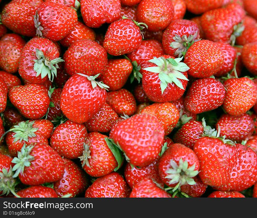 Fresh large strawberry close up. Fresh large strawberry close up