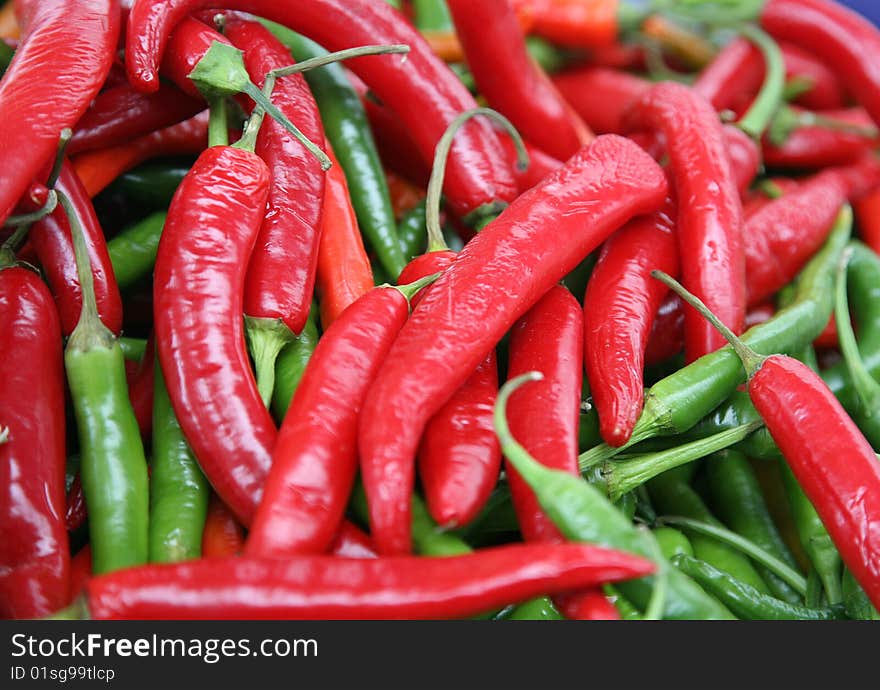 Red and green hot pepper chilly close up