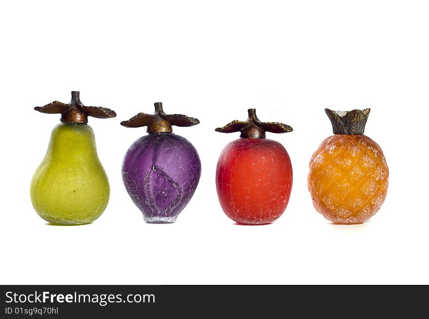 Assorted glass fruit isolated on white background