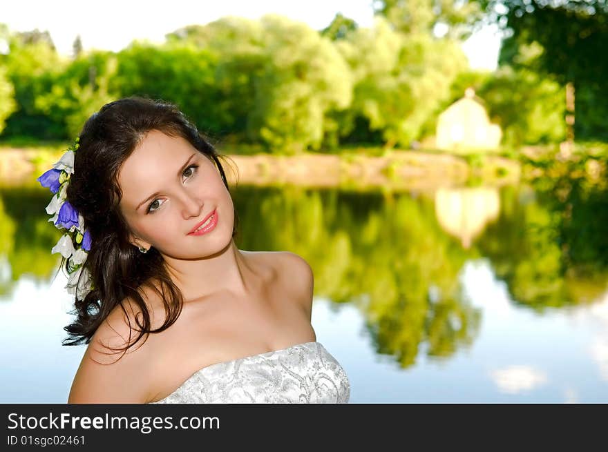 Young smiling woman in the park