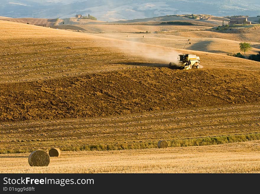 Tractor working in agriculture field. Tractor working in agriculture field