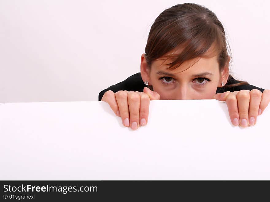 Smiling woman with a blank bulletin board over white. Smiling woman with a blank bulletin board over white