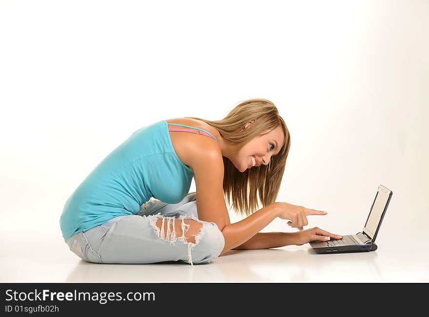 Beautiful young female with laptop