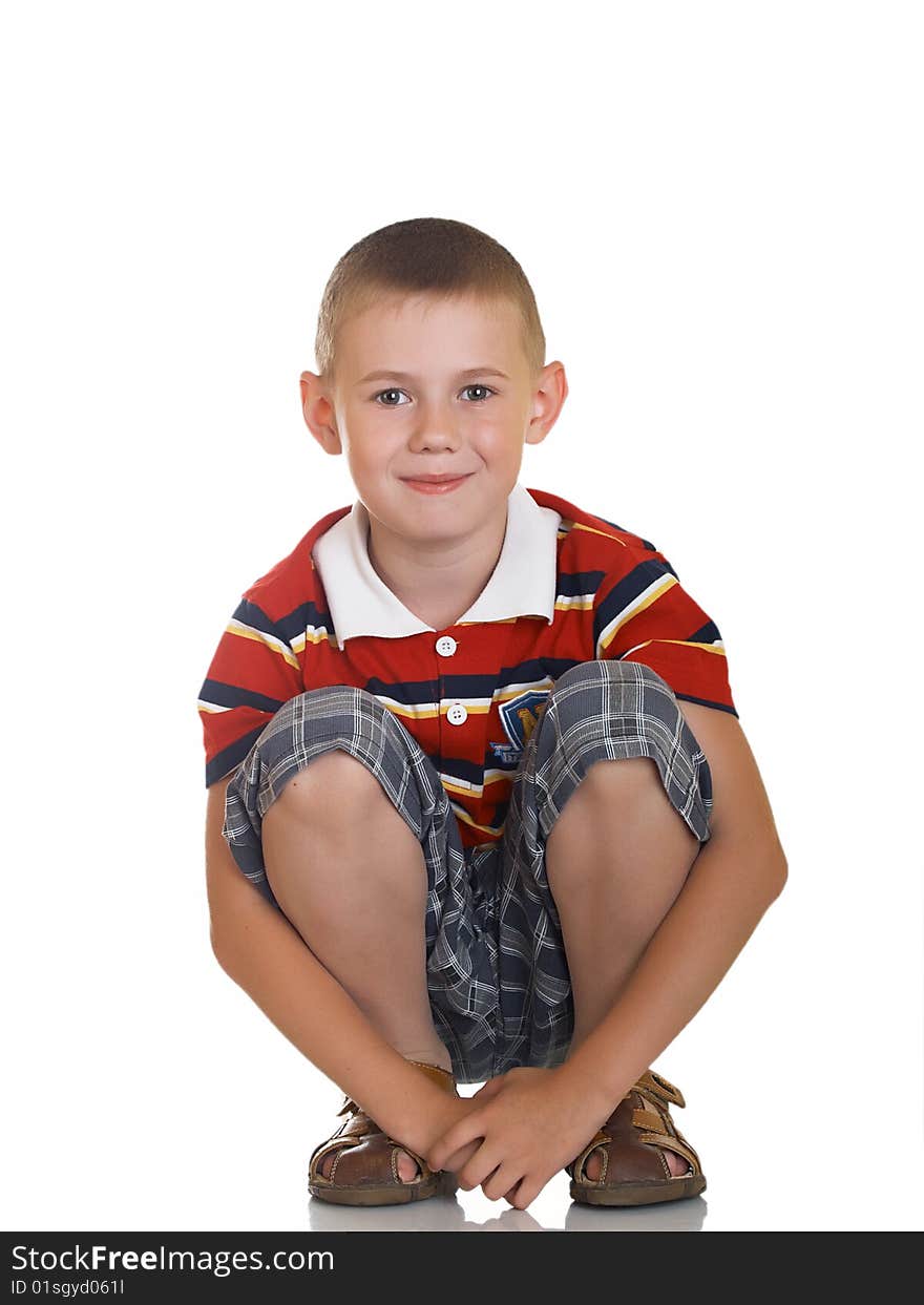 Portrait of the boy sitting on a floor. Portrait of the boy sitting on a floor