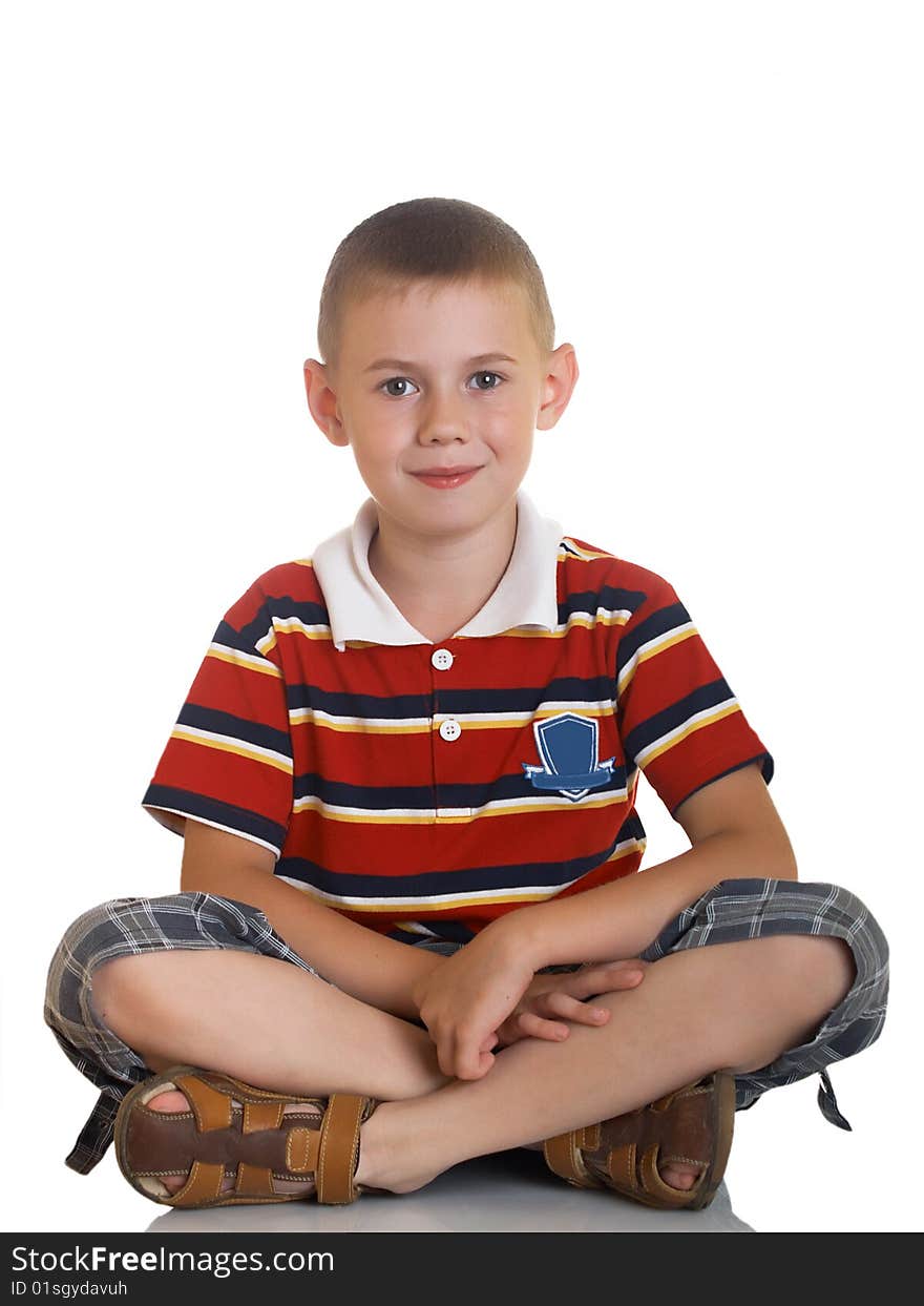 Portrait of the boy sitting on a floor. Portrait of the boy sitting on a floor