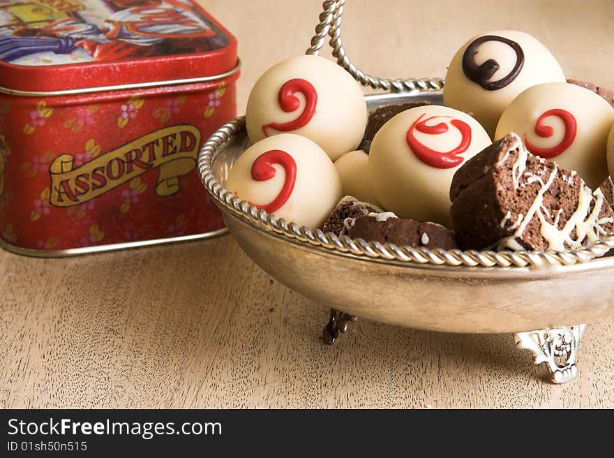 Truffles and special cakes with chocolate and vanilla icing