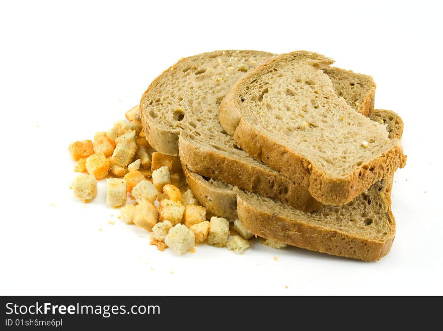 Bread and zwieback on white background