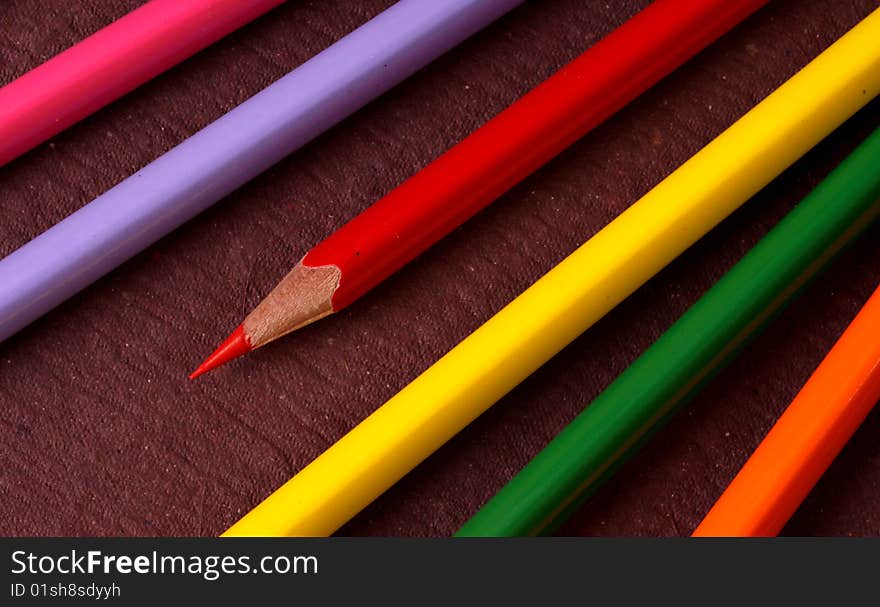 Multicolored pencils with handmade paper