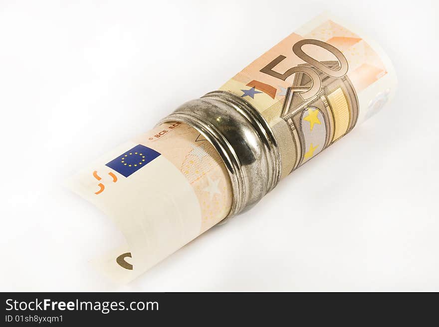 A rolled up fifty euros bill in a silver napkin ring