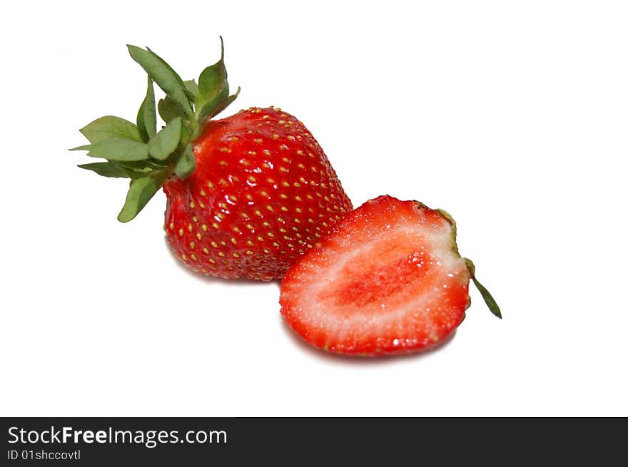 Two strawberries isolated on white background