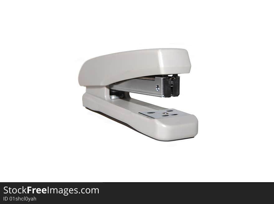 Grey office stapler on a white  background