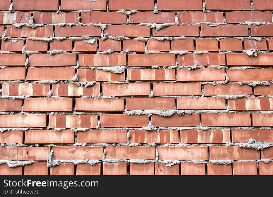 Fragment red wall brickwork with flow cement