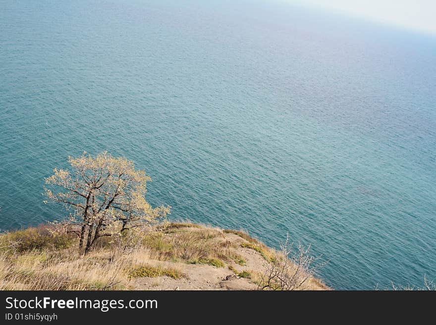 The view from the small island into the dark blue sea. The view from the small island into the dark blue sea