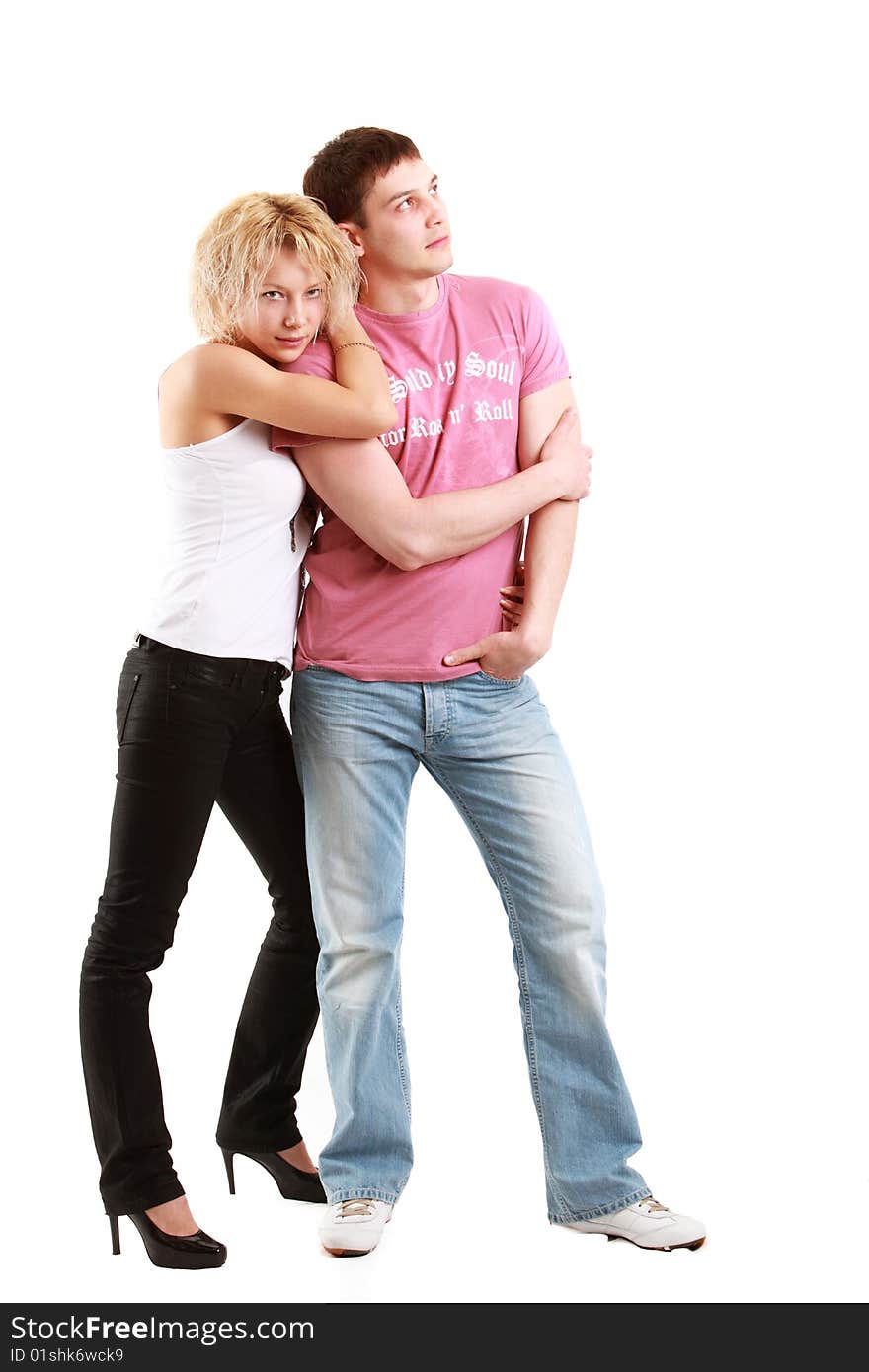 Image of the young couple posing on white