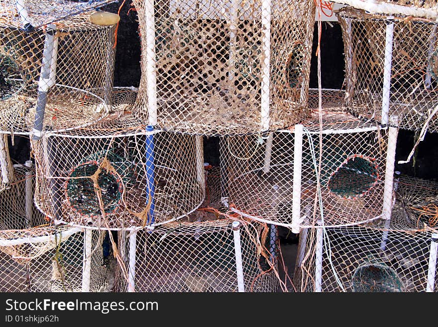 Hand made fishing nets used by fishermen in the deep blue sea