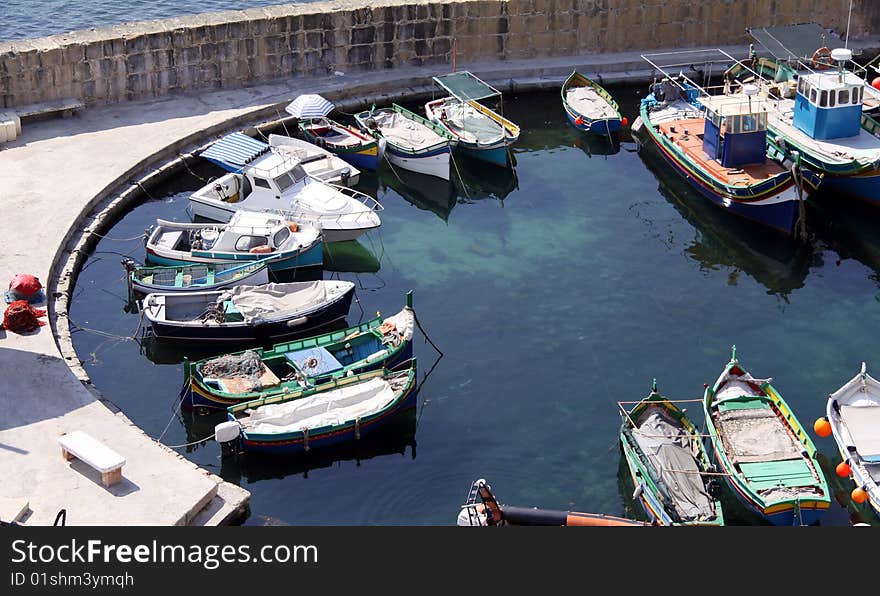 A small old fishing marina in the heart of gozo,malta. A small old fishing marina in the heart of gozo,malta