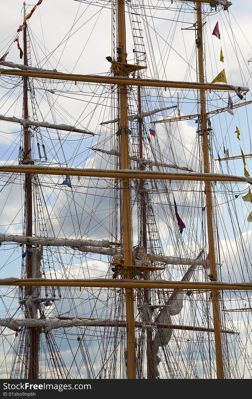 Tall yacht masts with sky background. Tall yacht masts with sky background