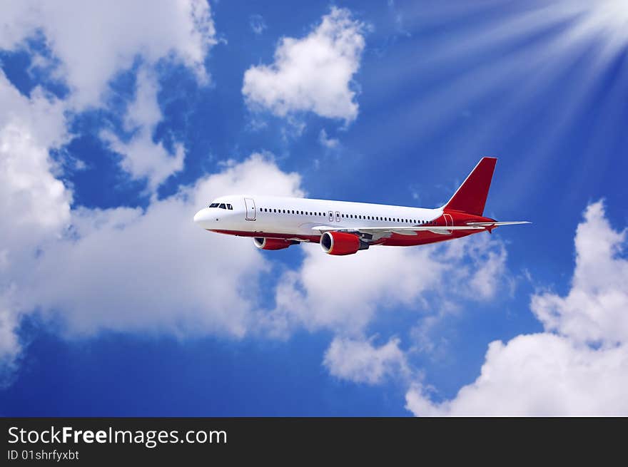 Airplane in air on blue sky