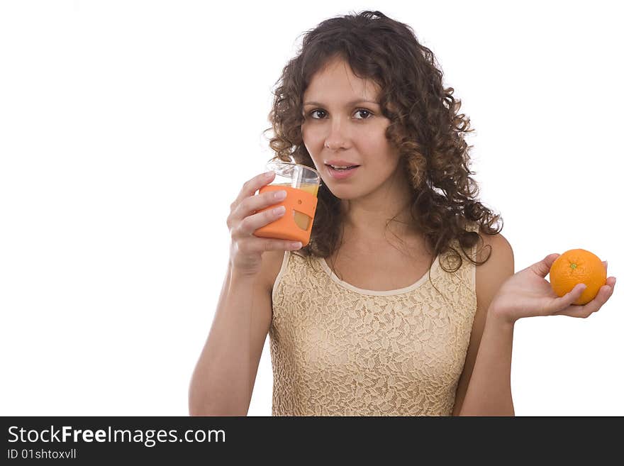 Beautiful young girl with orange. Woman is drinking orange juice. Pretty Woman and Fruit Diet Series. Isolated over white background.