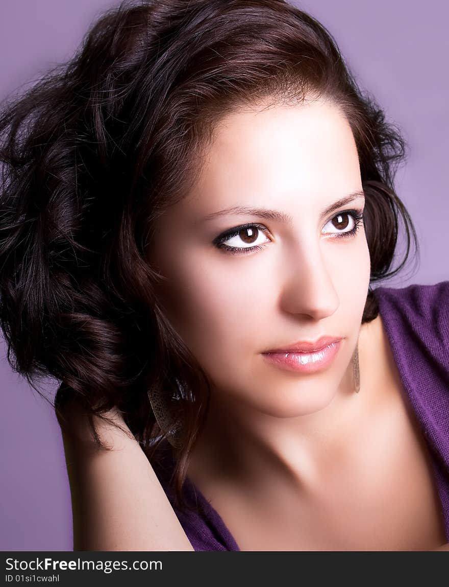 Attractive young brunette model posing , studio shot