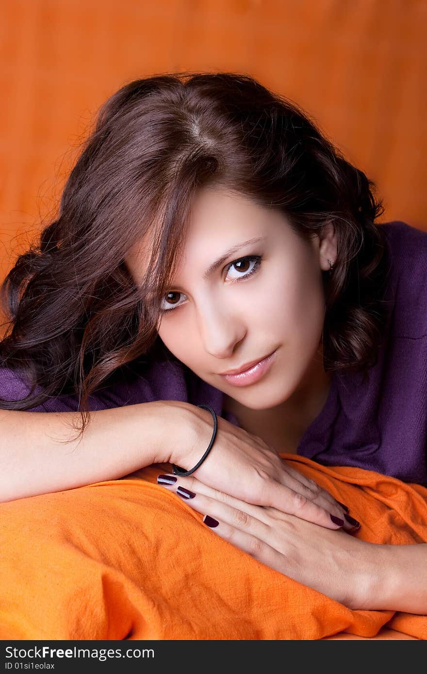 Attractive young brunette model posing , studio shot