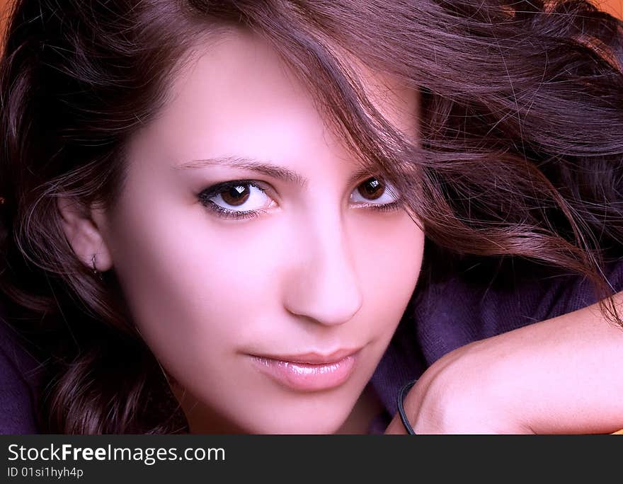 Attractive young brunette model posing , studio shot