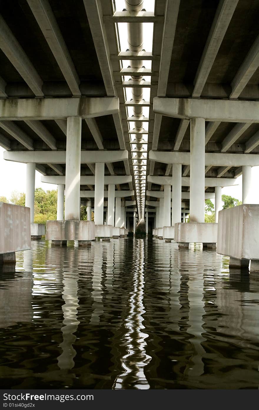 Underneath concrete bridge