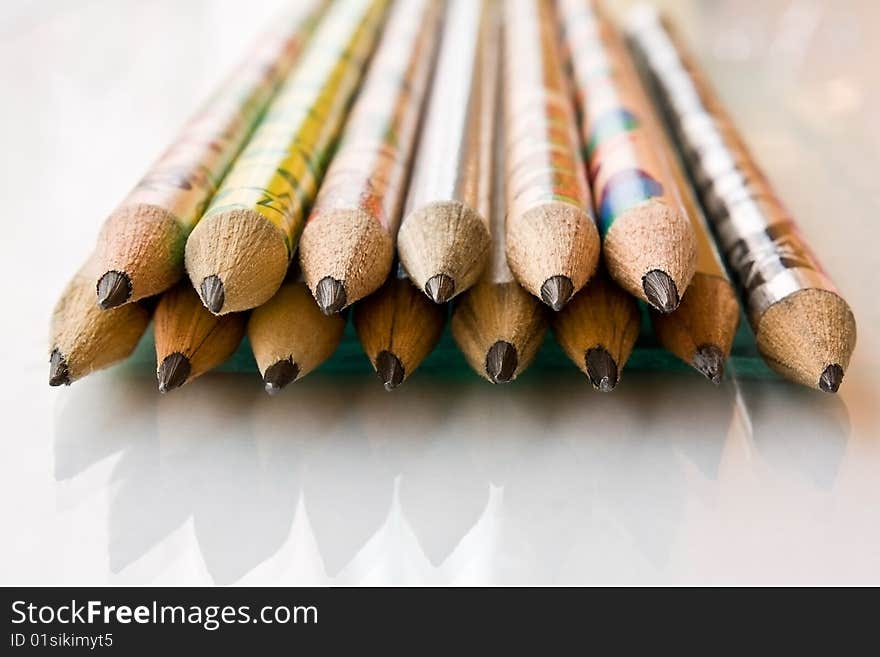 A lot of pencils in the bright background