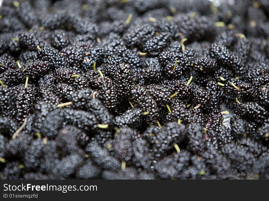 Close up of a group of fresh, succulent mulberries