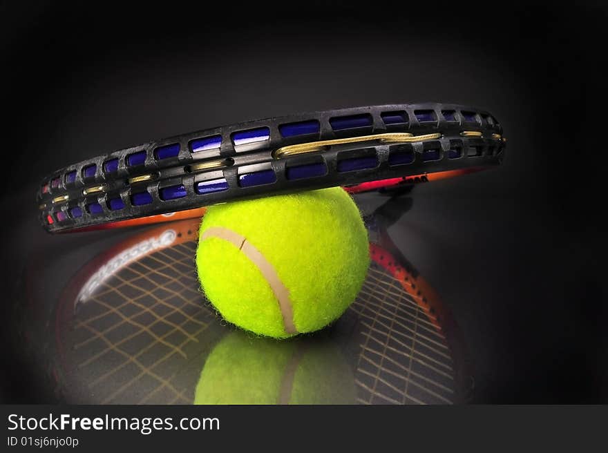 Tennis ball and racket