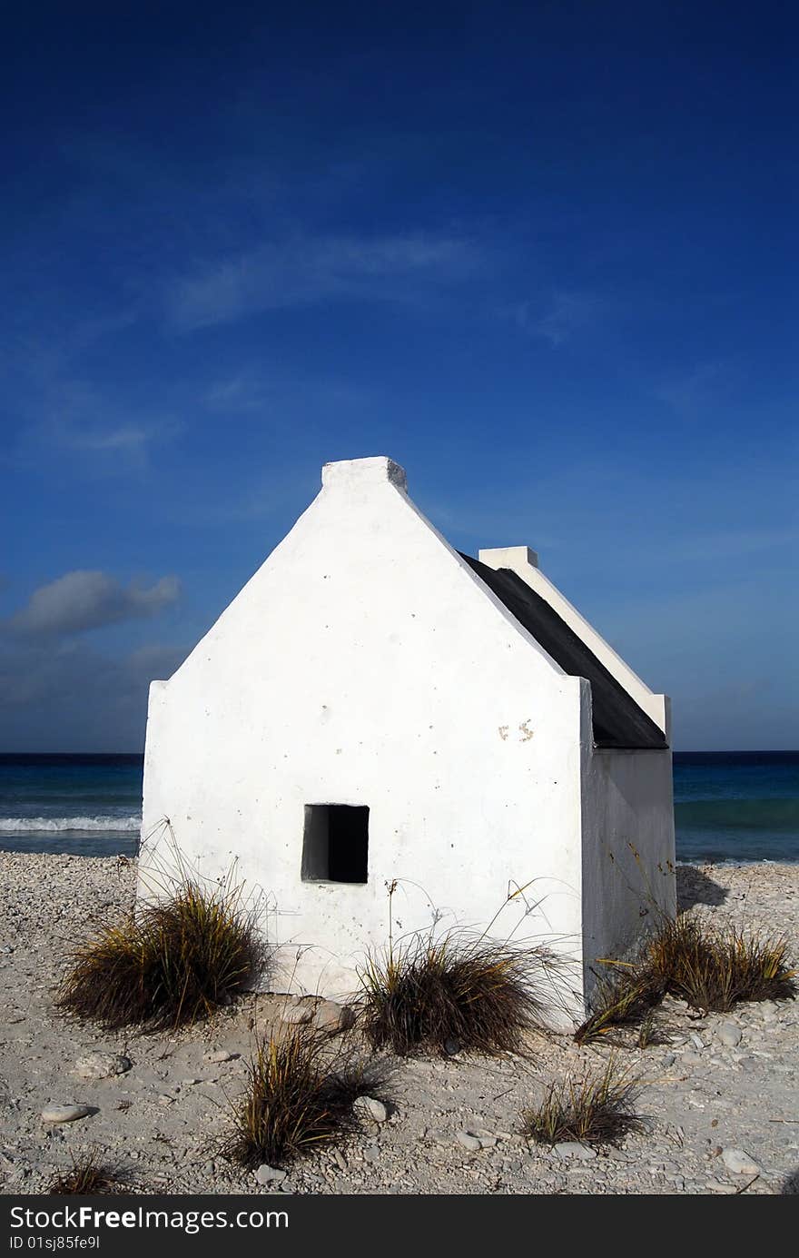 White building formerly used to house slaves used in salt industry in Bonaire. White building formerly used to house slaves used in salt industry in Bonaire.