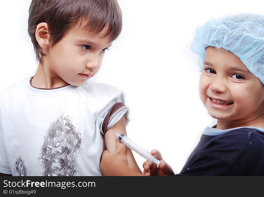 Two kids playing doctors