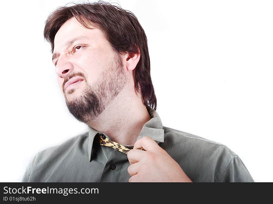 Man wearing shirt and tie with boring expression o