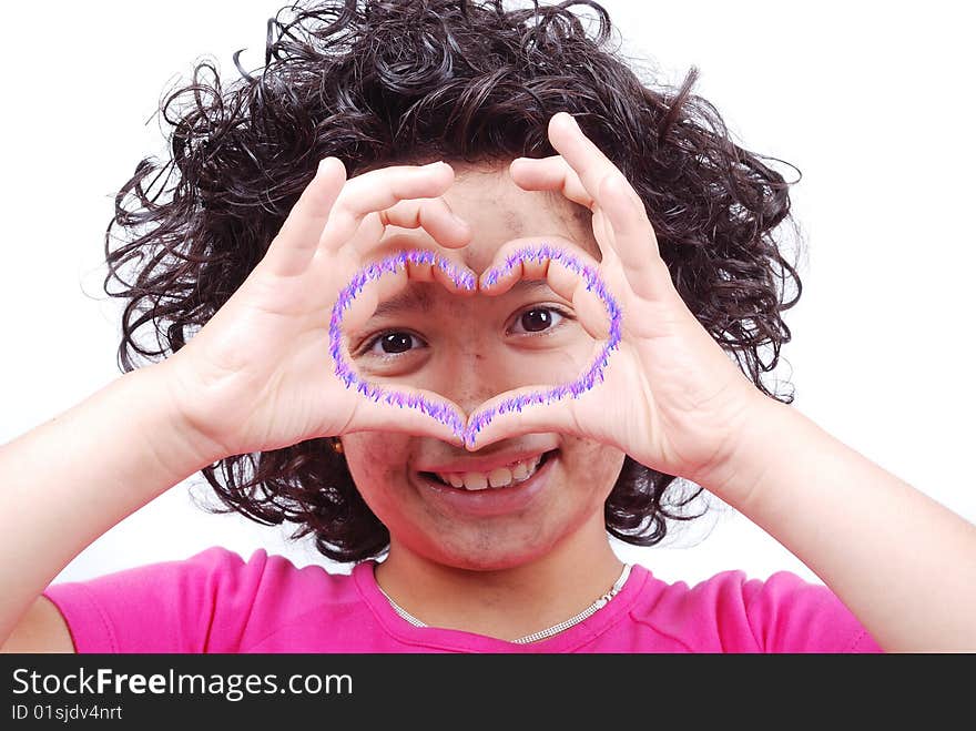 Girl with heart shaped hands