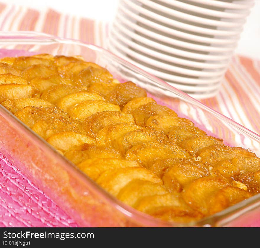 Apple pie or cobbler in a glass dish